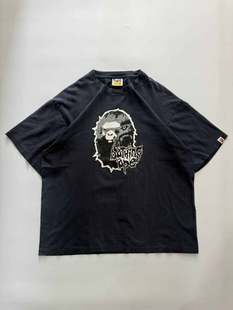 BAPE Navy Blue Big Head Shirt (Category: Tshirts & Polo Shirts ) located in Manila. Submitted by grailsociety.ph (Listing ID 1460257035, Image 1). Description: BAPE Navy Blue Big Head Shirt Tag Size - XXLarge Measurements: Length- 29" Width- 24.5" Good Condition Issue: Dot holes Price: ₱1,900 Model details: 5'8 81kg.
