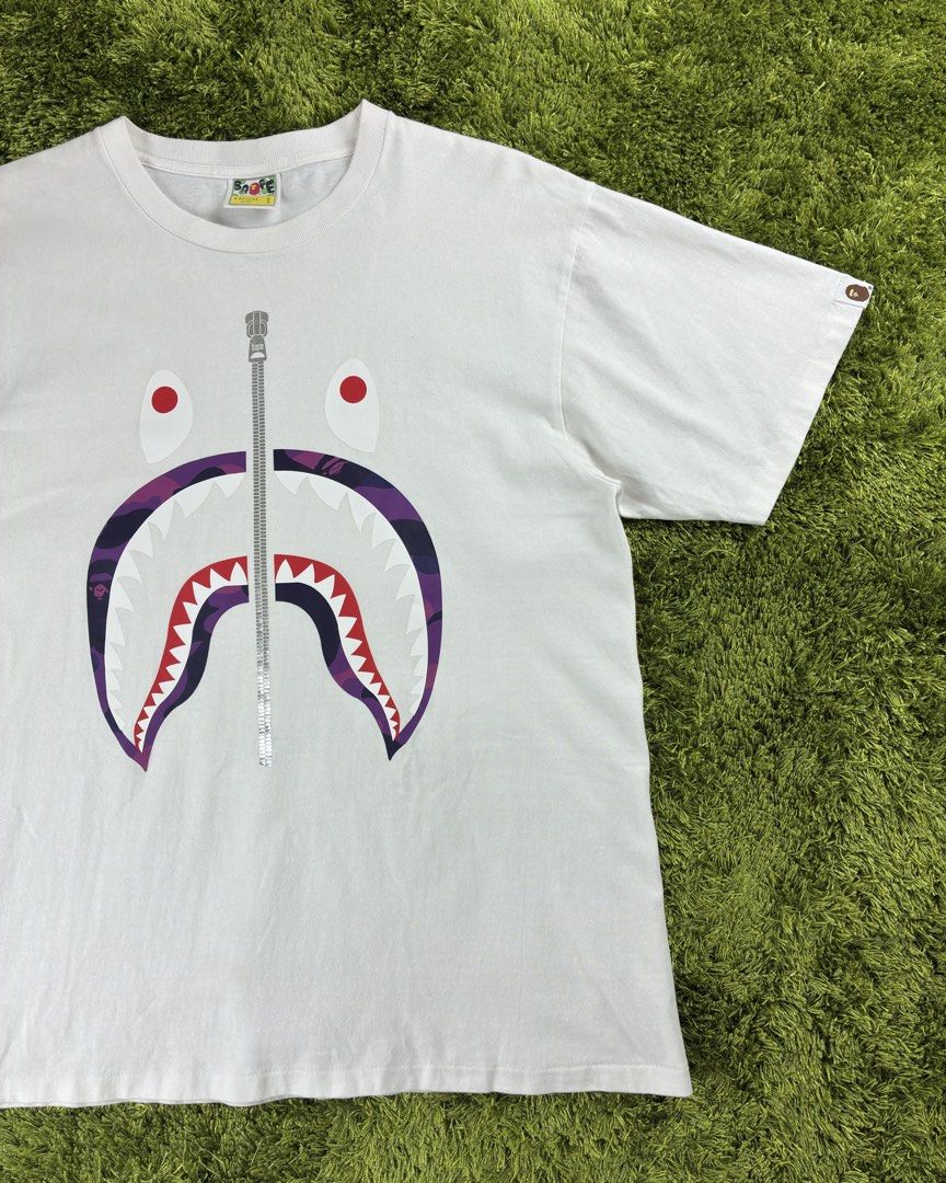 Bape Shark Purple Camou Tee (Category: Tshirts & Polo Shirts ) located in Lucena. Submitted by shopdotmane (Listing ID 1460245652, Image 2). Description: Bape Shark Purple Camou Tee Large on tag 21 (width) x 28 (Length) Excellent condition .