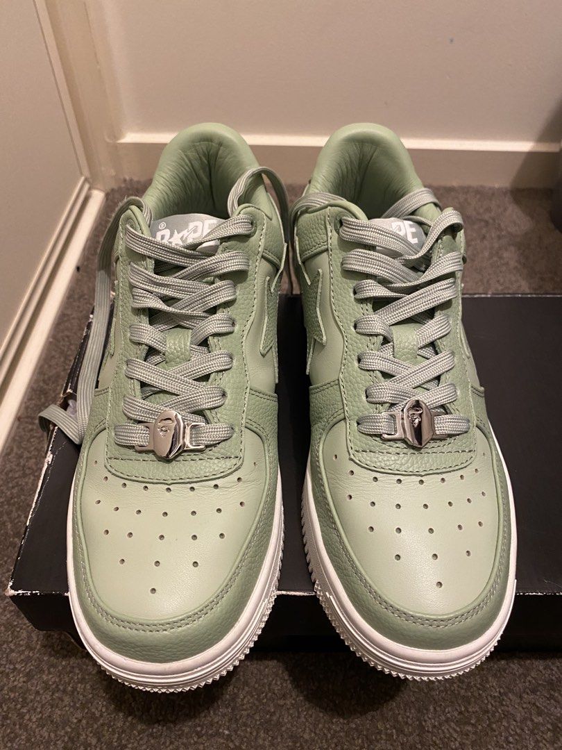 BAPE STA Low Green Leather Sneakers (Category: Sneakers) located in Calapan. Submitted by yowstuff (Listing ID 1460216537, Image 2). Description: - Green BAPE STA Lows - Size 7 US Men's - Leather upper with textured panels - Classic star logo on the side - Comes with original box.