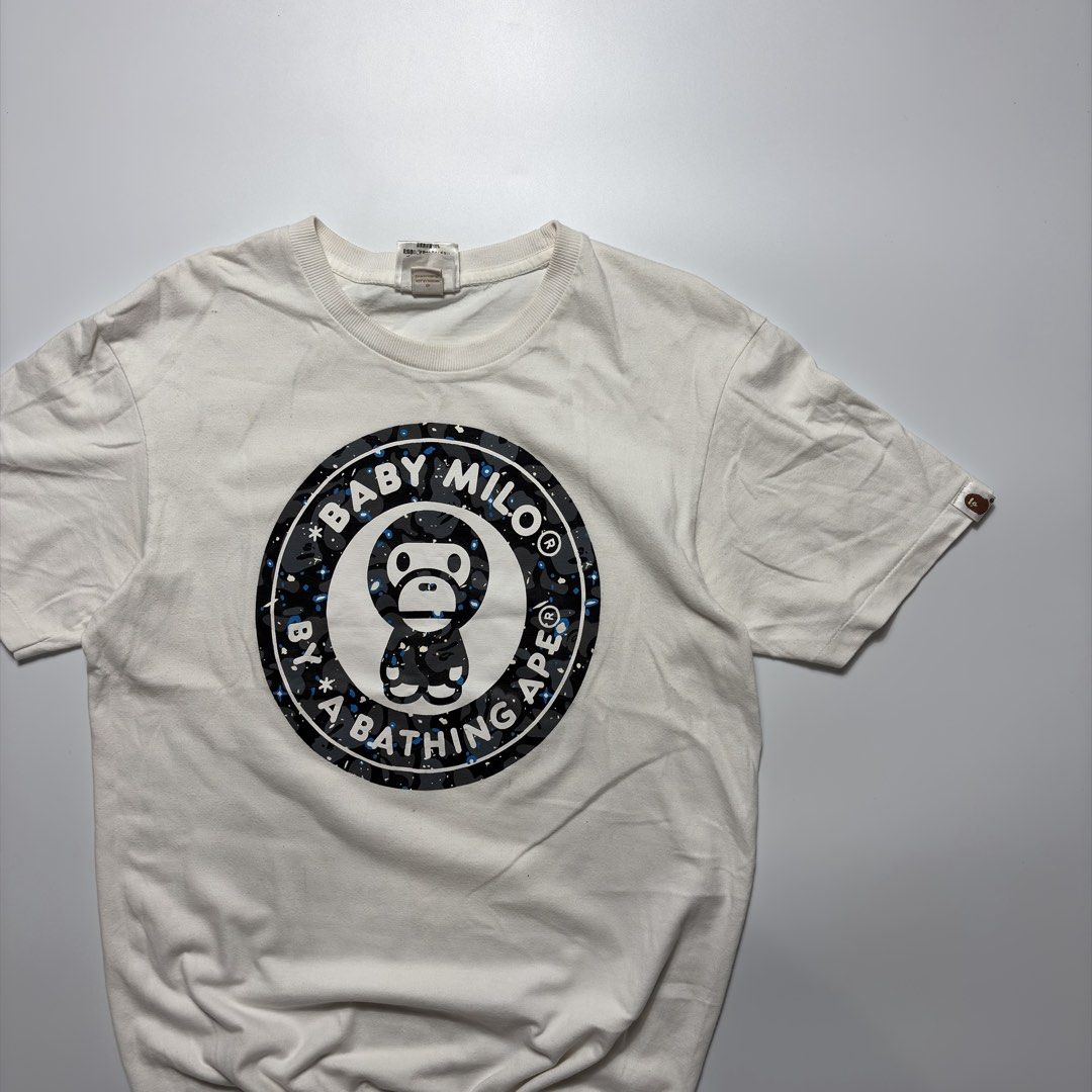 Bape x Baby Milo Tee (Category: Tshirts & Polo Shirts ) located in Makati City. Submitted by tulakngdamit.ph (Listing ID 1460276551, Image 2). Description: WTS! Bape x Baby Milo Tee Width: 18 Inches Length: 26 Inches Excellent.