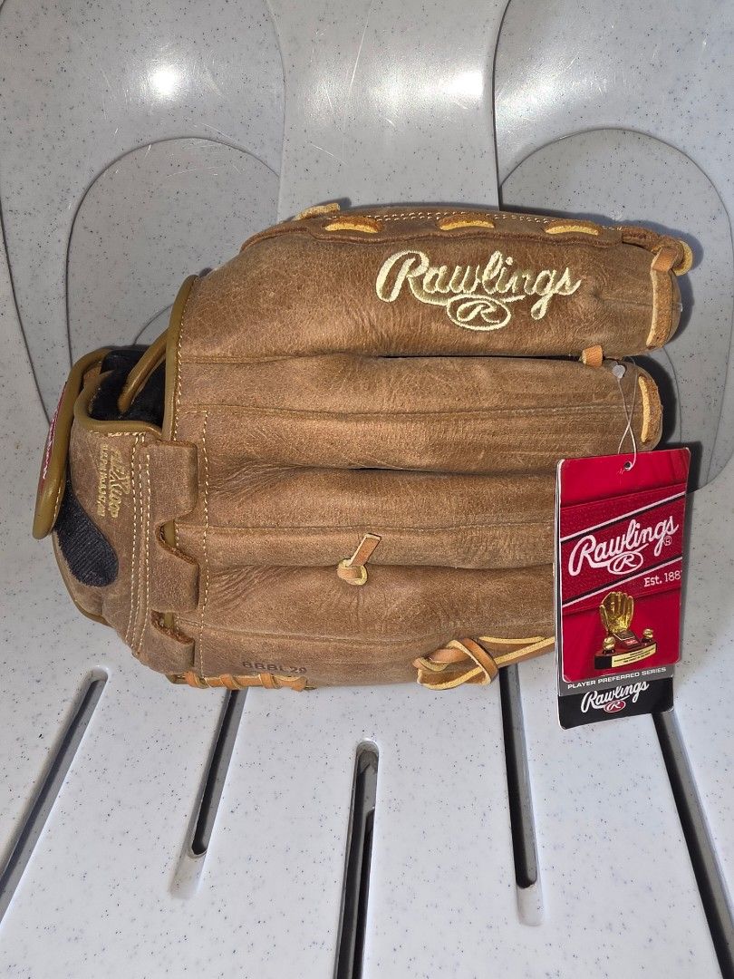Baseball Glove (Category: Racket and Ball Sports) located in Baguio. Submitted by shellcollector (Listing ID 1460159460, Image 2). Description: Rawlings Baseball Gold Glove PP120R 12” Player Preferred New, with hangtag For lefthand thrower 2500 Pesos Baguio shipping.
