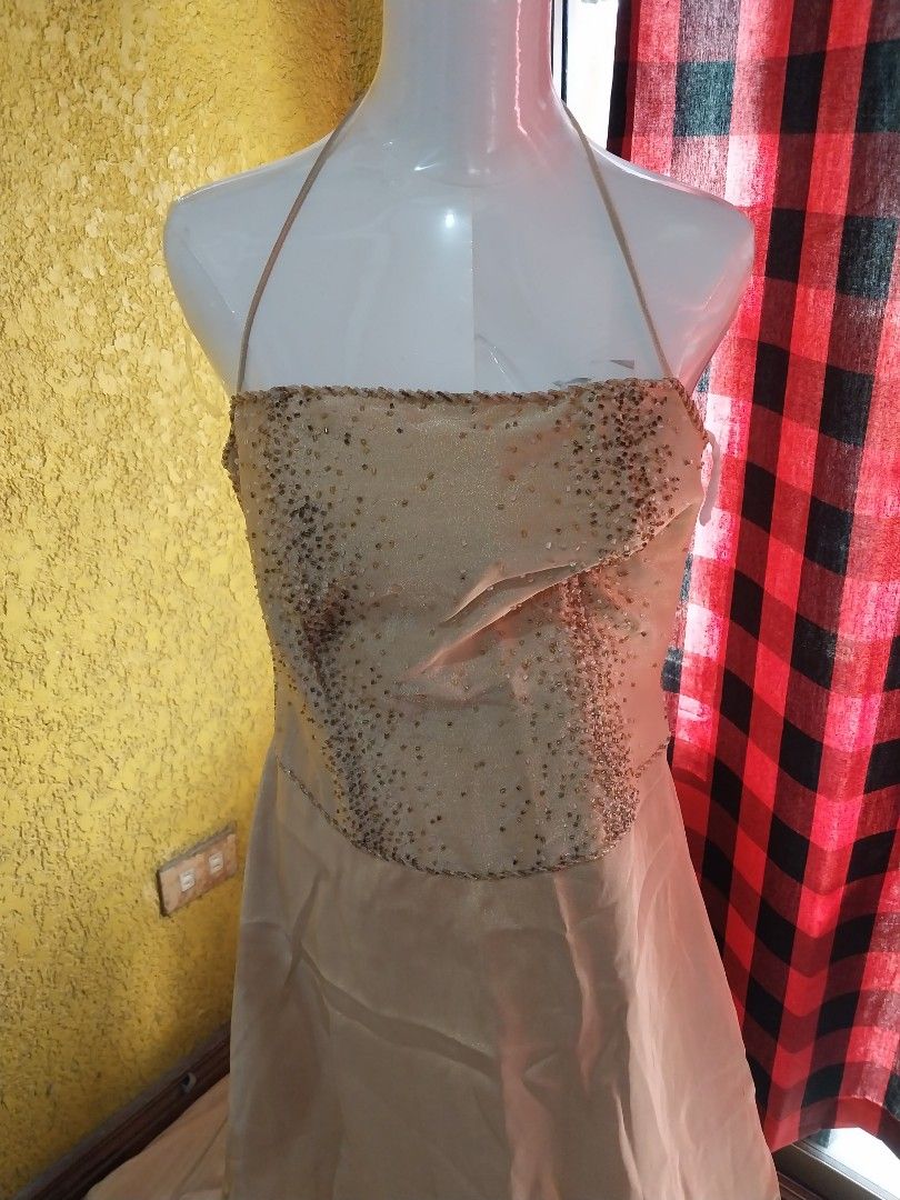 Beaded Bodice Formal Gown (Category: Evening dresses & gowns) located in Manila. Submitted by PrinceDani.Clothing (Listing ID 1460246105, Image 2). Description: gold bodice gown Size 32in bust 33in waist more than 60in length excellent condition .