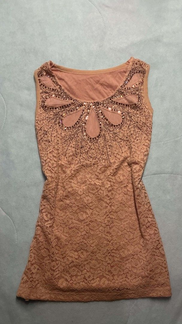 Beaded Lace Sleeveless Top (Category: Sleeveless) located in Binan City. Submitted by myks_thrift (Listing ID 1460161225, Image 1). Description: - Sleeveless top - Intricate beadwork around the neckline - Lace overlay on the bottom half - Ideal for night outs or special occasions - Comfortable and stylish.