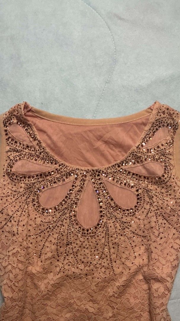 Beaded Lace Sleeveless Top (Category: Sleeveless) located in Binan City. Submitted by myks_thrift (Listing ID 1460161225, Image 2). Description: - Sleeveless top - Intricate beadwork around the neckline - Lace overlay on the bottom half - Ideal for night outs or special occasions - Comfortable and stylish.