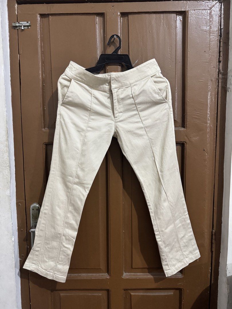 Beige Low-Waisted Flare Pants Crop Length (Category: Other Bottoms) located in San Pedro. Submitted by annjacob (Listing ID 1460278459, Image 1). Description: - Beige low-waisted pants - Flare at the bottom - Button and zip front closure - Two front pockets - Two back pockets - Sturdy cotton blend fabric - Versatile for dressing up or down - from Japan.