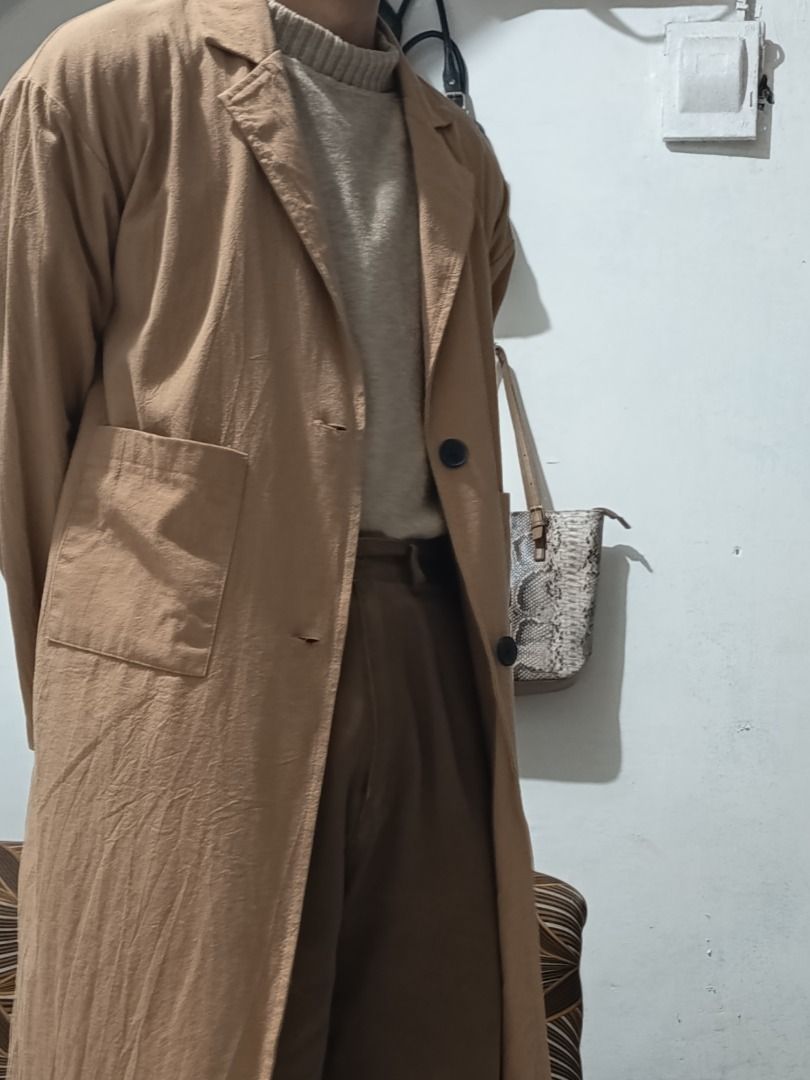 Beige Long Coat (Category: Coats, Jackets and Outerwear) located in Caloocan City. Submitted by brightdeer-5fe2 (Listing ID 1460270456, Image 3). Description: Beige Long Coat 🤎 • Good condition • Clean, no major flaws • Nice oversized/relaxed fit • Linen-like material • Perfect for casual & smart casual outfits ₱750 — negotiable 📩 PM if interested 📦 Shipping / meetup available RFS: decluttering First come, first served! You can message me on F