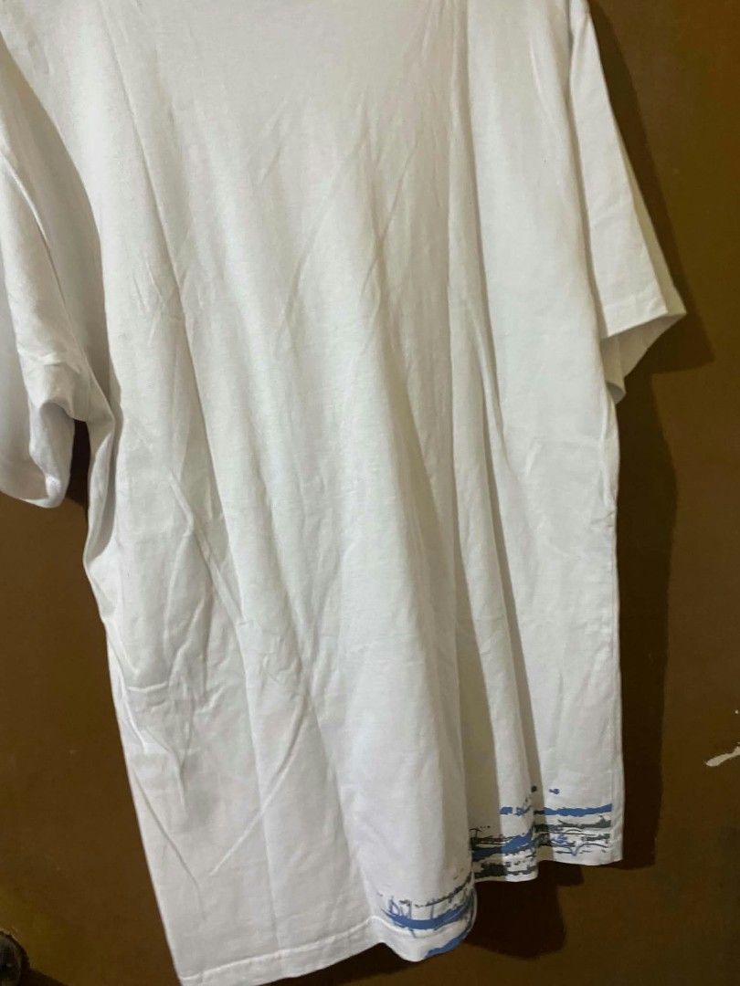 Billabong White Graphic T-Shirt (Category: Tshirts & Polo Shirts ) located in Taguig. Submitted by cabugchear34421 (Listing ID 1460273887, Image 3). Description: - Vintage Billabong t-shirt - All-over graphic print - Blue and grey Billabong logo detail - No issue.