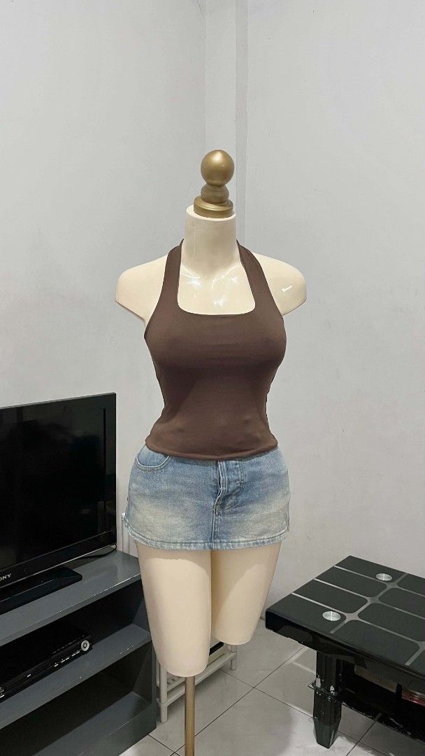 Black & Brown Halter Neck Tank Top (Category: Sleeveless) located in Pasay City. Submitted by zvrinana (Listing ID 1460281033, Image 2). Description: - Basic black & brown halter top - Stretchy material for a comfortable fit - Chic square neckline - Versatile: great for layering or wearing on its own - Snug fit - Effortlessly pairs with any outfit.