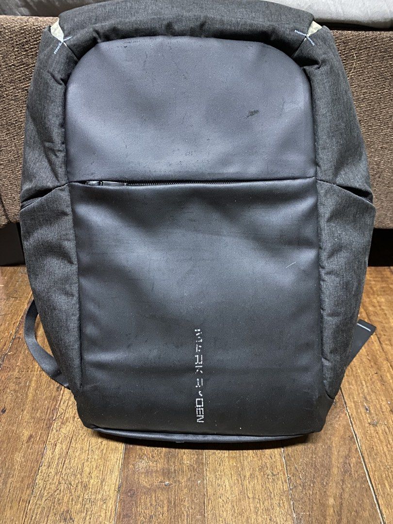 Black Backpack with Multiple Compartments (Category: Backpacks) located in Quezon City. Submitted by natesm (Listing ID 1460208561, Image 1). Description: - Stylish dark grey backpack - Front zip pocket and two side pockets for easy access - Multiple interior compartments for excellent organization - Padded straps and back for maximum comfort - Convenient side USB charging port (cable not included) - Ideal for daily commutes, school, or travel ad
