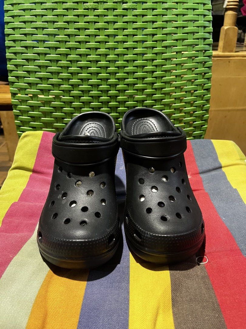 Black Crocs High Heel Platform Shoes (Category: Heels) located in Davao. Submitted by wornbycathy (Listing ID 1460300449, Image 3). Description: - Unique black Crocs design - Features a stylish high heel and platform - Perfect for making a statement and adding fun to outfits - Comfortable Crocs material - Ideal for parties or standing out.
