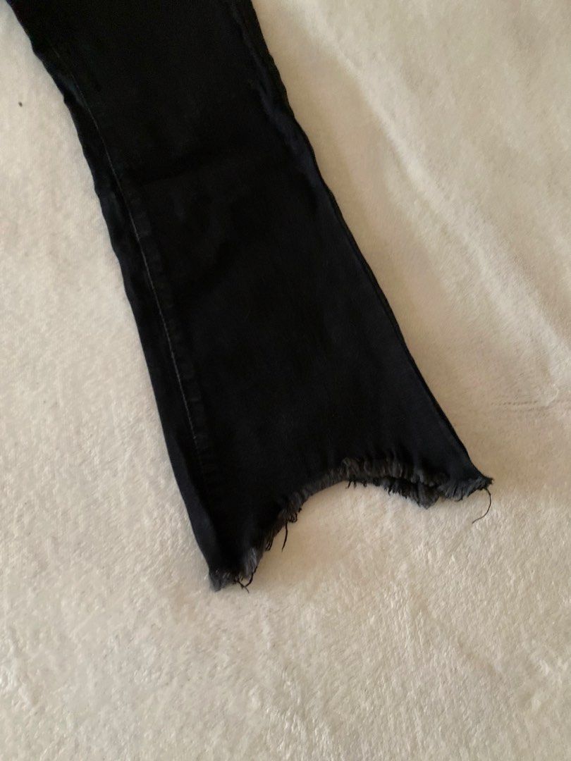 Black Flare Jeans with Raw Hem - Size 27 (Category: Jeans) located in Batangas. Submitted by v.ukay (Listing ID 1460132778, Image 2). Description: - Black flare jeans - Raw hem detail - Slight stretch for comfort - Trendy and casual style - Size 27 (check measurements if needed).