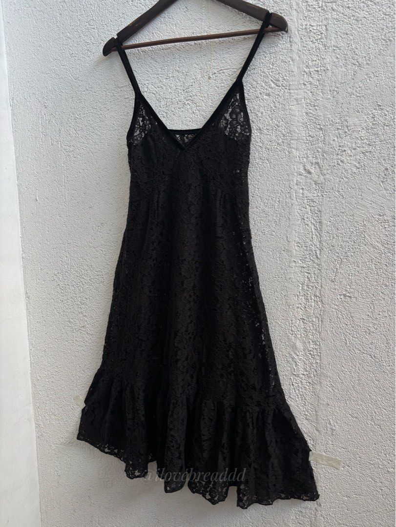 Black Lace Dress (Category: Dresses) located in Davao. Submitted by ilovebreaddd (Listing ID 1460285715, Image 2). Description: - Chic black lace dress - Spaghetti straps - Flattering V-neckline - Feminine ruffle hem detail - Versatile slip dress style - Beautiful, intricate lace pattern.