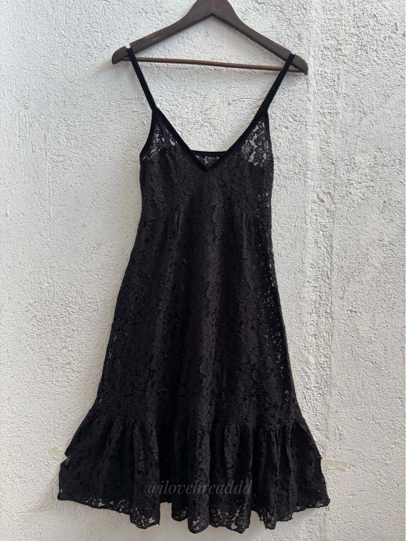 Black Lace Dress (Category: Dresses) located in Davao. Submitted by ilovebreaddd (Listing ID 1460285715, Image 3). Description: - Chic black lace dress - Spaghetti straps - Flattering V-neckline - Feminine ruffle hem detail - Versatile slip dress style - Beautiful, intricate lace pattern.