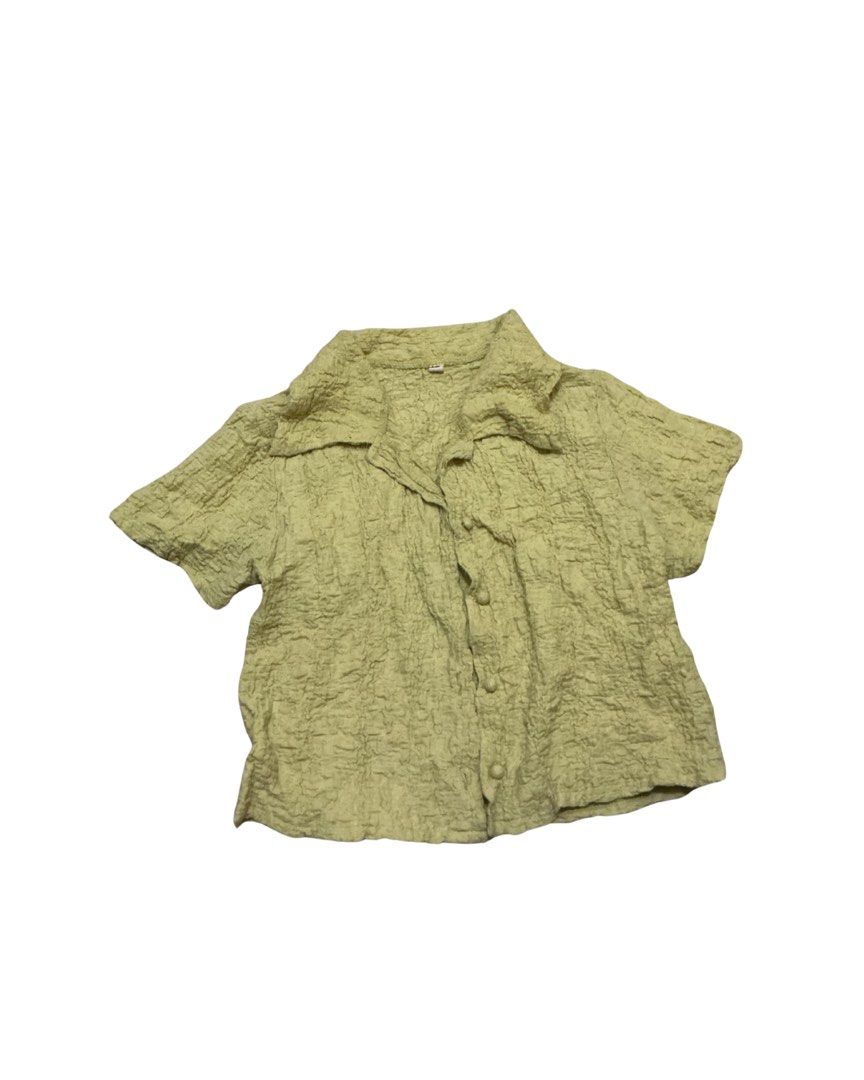 Black Lace Ruffle Blouse (Category: Blouses) located in Manila. Submitted by skylurker.star (Listing ID 1460160423, Image 2). Description: - Black short-sleeve blouse - Features delicate lace details on the sleeves - Ruffled neckline for a feminine touch - Button-up front for adjustable styling - Highly versatile: perfect for dressing up or down - Suitable for any occasion.