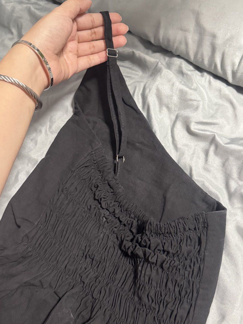 Black Linen Asymmetrical Top (Category: Sleeveless) located in Manila. Submitted by lavenderguava68 (Listing ID 1460226108, Image 3). Description: Never used. Fitted lang. Only reason for selling is I prefer na nasa right shoulder yung strap instead of sa left. :) Idk where the white marks came from but looks washable. Fits XS-S.