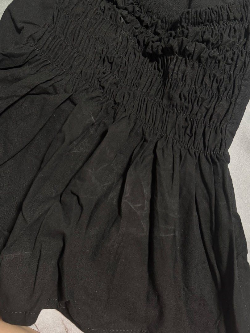 Black Linen Asymmetrical Top (Category: Sleeveless) located in Manila. Submitted by lavenderguava68 (Listing ID 1460226108, Image 2). Description: Never used. Fitted lang. Only reason for selling is I prefer na nasa right shoulder yung strap instead of sa left. :) Idk where the white marks came from but looks washable. Fits XS-S.