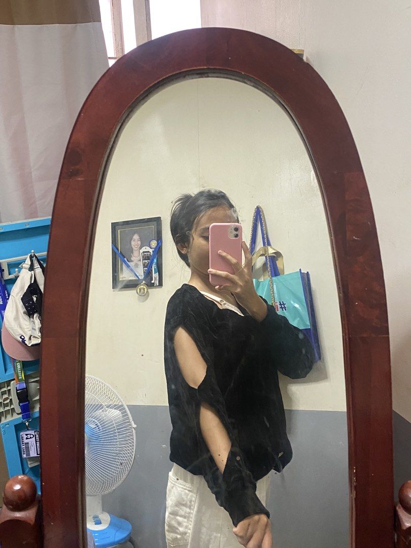 Black Off-Shoulder Cut-Out Sleeve Top (Category: Blouses) located in Manila. Submitted by janinaridoloso (Listing ID 1460181765, Image 3). Description: - Chic black off-shoulder top - Features stylish cut-out details on sleeves - Super comfy and versatile - Ideal for casual outings or nights with friends - Easily pairs with jeans or skirts.