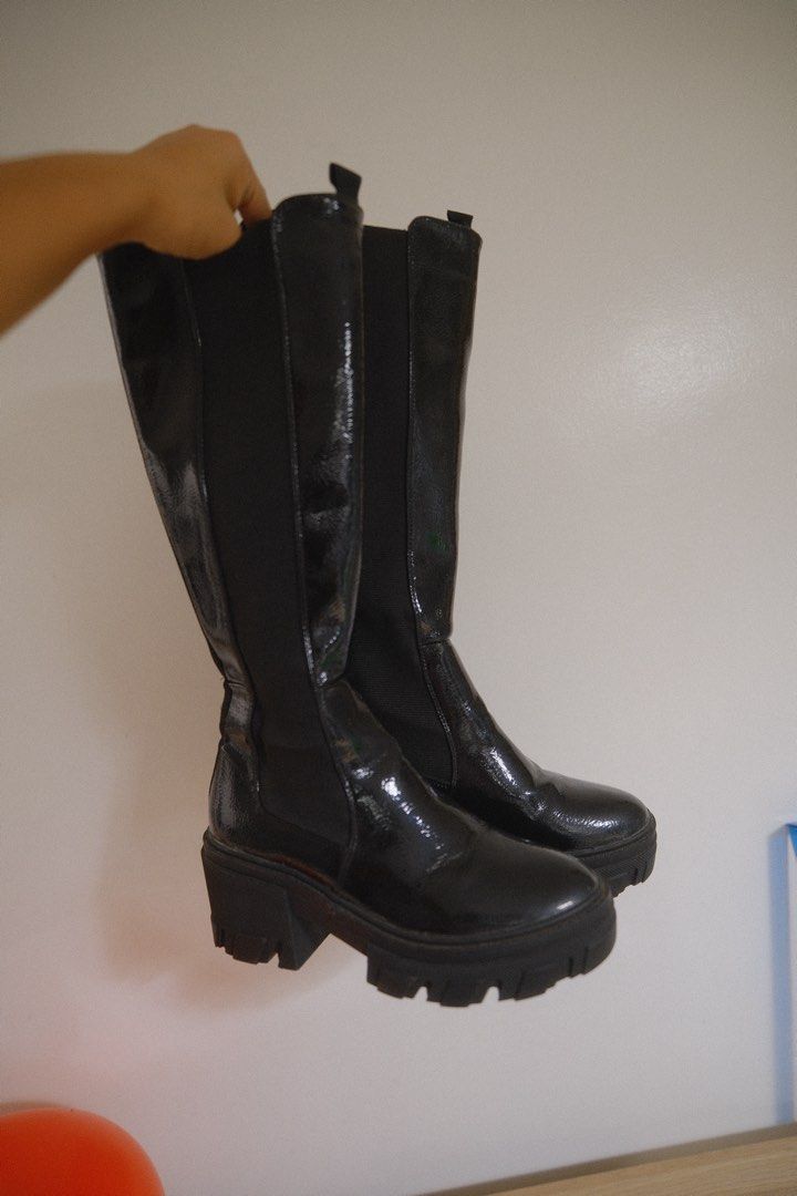 Black Patent Knee-High Chunky Boots (Category: Boots) located in Antipolo. Submitted by jillban (Listing ID 1460290936, Image 1). Description: - Black patent knee-high boots - Chunky lug sole - Elasticated side panels for easy pull-on style - Originally from Forever 21 - Perfect for dressing up or down -Only used once.