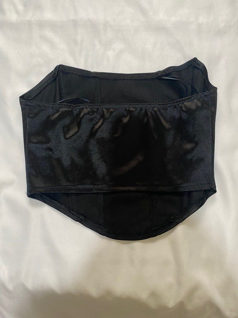 Black Satin Corset Top Strapless Bustier (Category: Sleeveless) located in Las Pinas. Submitted by shairaadriannx (Listing ID 1460137410, Image 2). Description: - Black satin corset top - Strapless bustier silhouette - Structured with boning for support and shape - Perfect for dressing up or down.