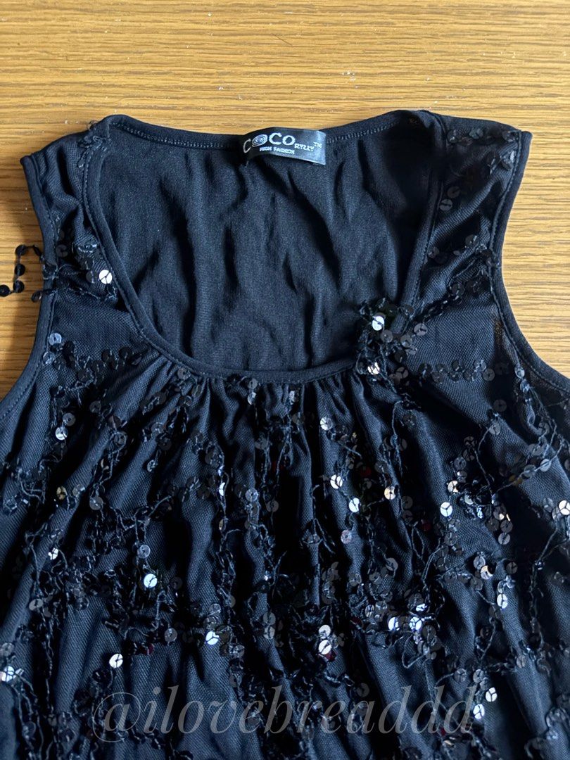 Black Sequin Embellished Sleeveless Top (Category: Sleeveless) located in Davao. Submitted by ilovebreaddd (Listing ID 1460283512, Image 2). Description: - Black sleeveless top - Sequin embellishments - Sheer overlay with intricate detailing - Round neckline.