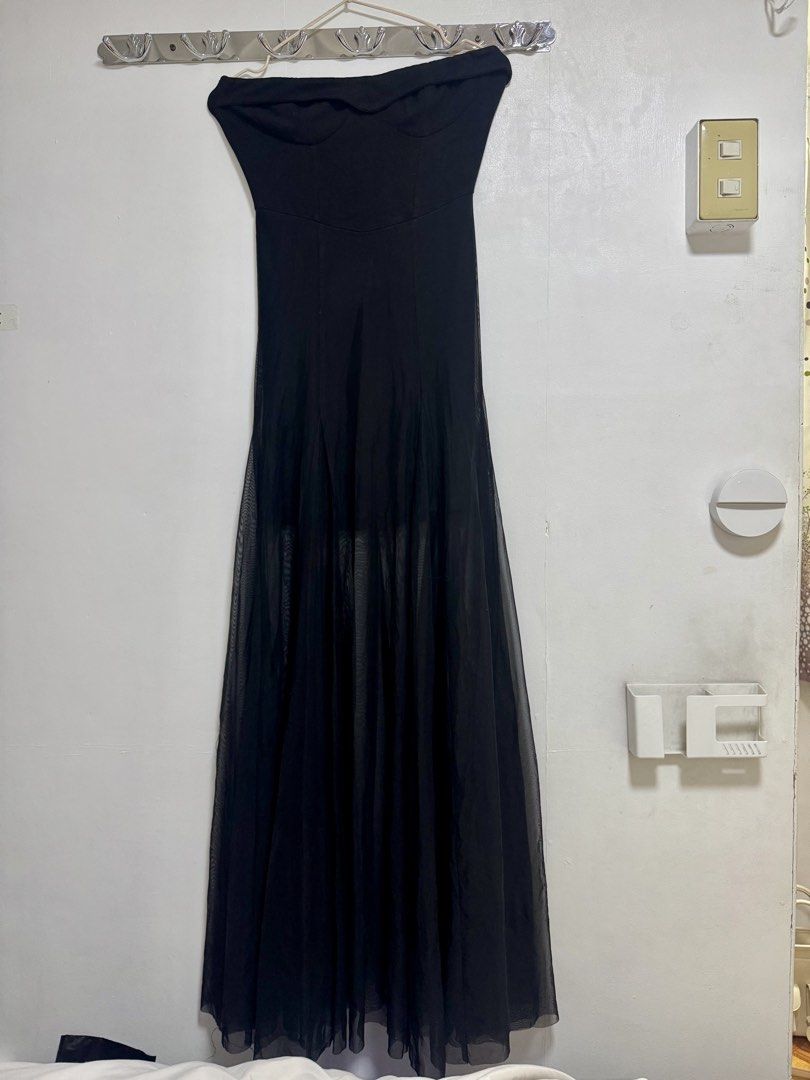 Black Strapless Maxi Dress with Sheer Overlay (Category: Dresses) located in Manila. Submitted by frenchmacaron (Listing ID 1460171263, Image 1). Description: - Black strapless maxi dress - Fitted bodice - Flowing sheer overlay skirt - Ideal for formal events or a night out - Minor snag on sheer fabric (visible in last photo) that’s why im selling it low.