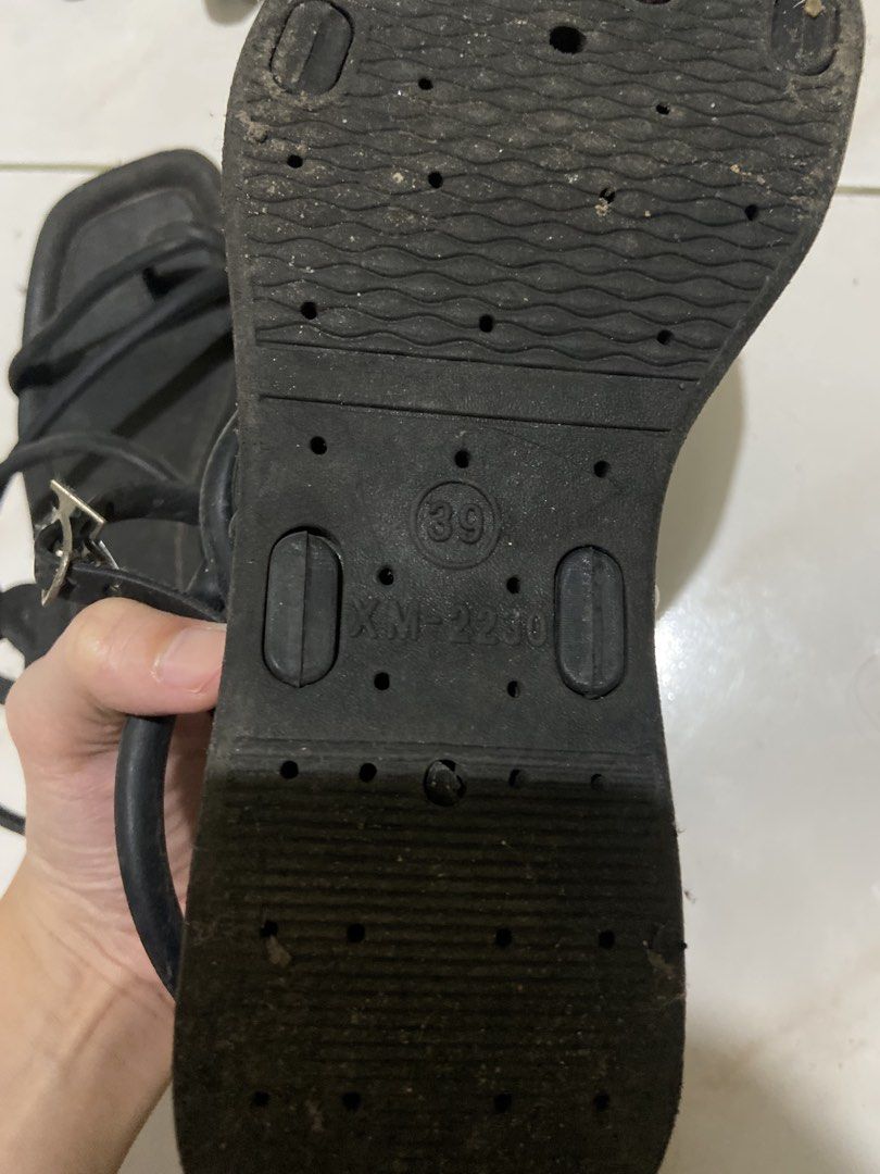 Black Strappy Sandals with Buckle (Category: Flats & Sandals) located in Quezon City. Submitted by ethereal908 (Listing ID 1460252466, Image 2). Description: - Black strappy sandals - Size 39 - Adjustable buckle closure - Sole has visible wear (please check photos for details).