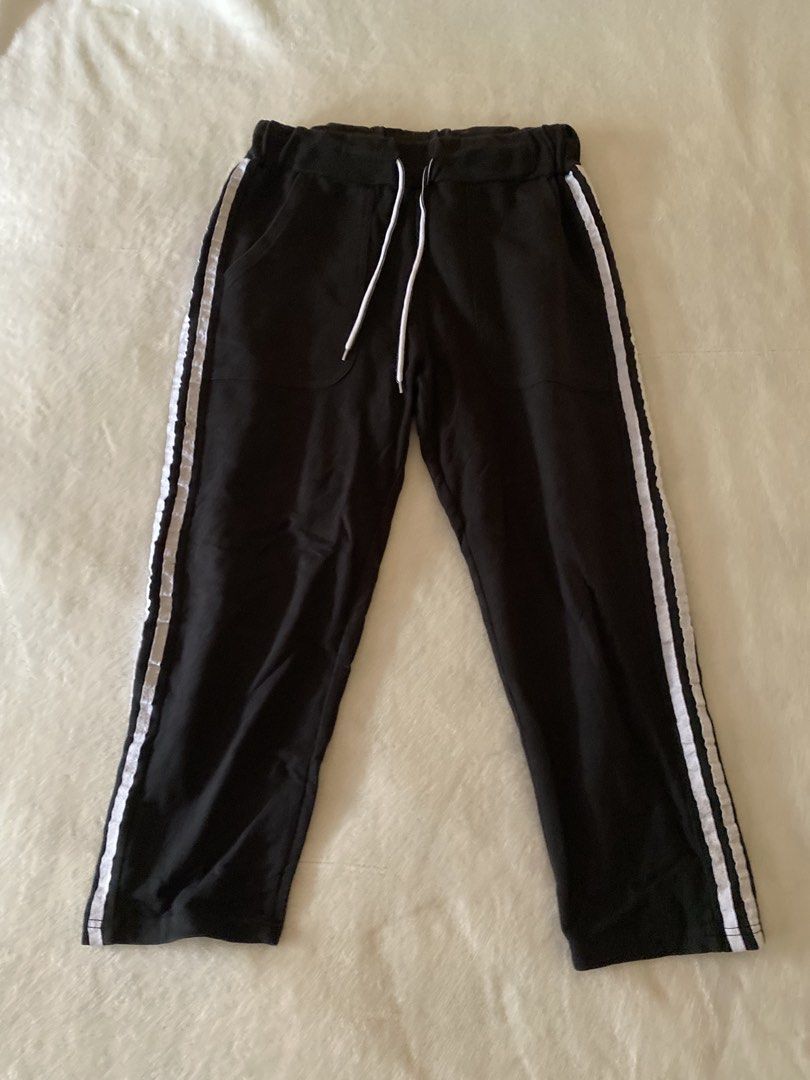 Black Track Pants with White Side Stripe - Size XL (Category: Other Bottoms) located in Batangas. Submitted by v.ukay (Listing ID 1460133908, Image 1). Description: - Black track pants - White stripes down the sides - Elastic waistband with drawstring - Two side pockets - Size XL but this was my S-sized sister - Ideal for casual wear or lounging.
