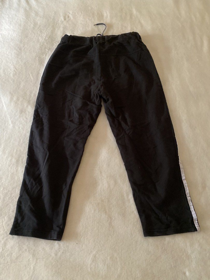 Black Track Pants with White Stripe Detail (Category: Other Bottoms) located in Batangas. Submitted by v.ukay (Listing ID 1460134051, Image 1). Description: xxs-xs - Black track pants - Elastic waistband for a comfortable fit - White stripe detail on each leg - Casual and versatile: great for lounging or light workouts - Ready for a new owner!.