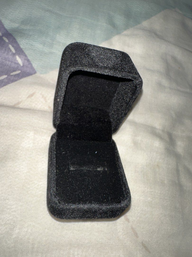 Black Velvet Ring Box (Category: Accessory Holder, Box & Organizers) located in Quezon City. Submitted by tobygabriel.696 (Listing ID 1460203711, Image 2). Description: - Black velvet ring box - Hinged lid opens to reveal velvet interior - Slot inside to hold a ring securely - Ideal for presenting gifts or storing jewelry - Compact and travel-friendly - Clean condition, inside and out.