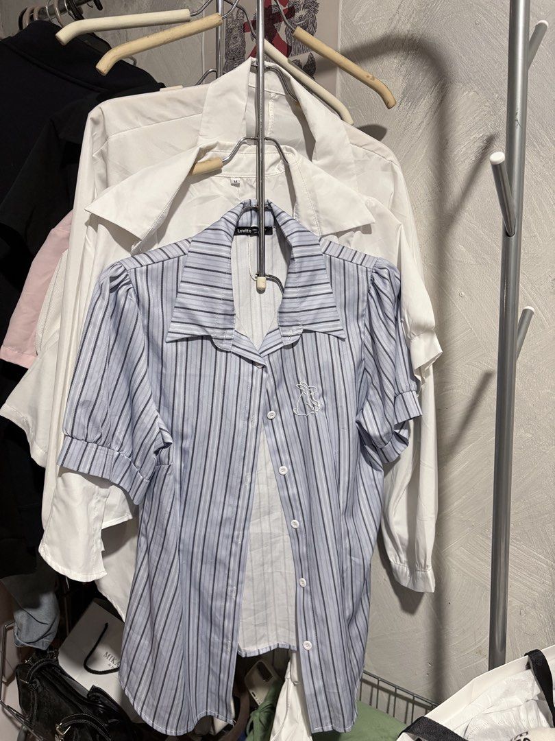 Blue and White Striped Button-Up Blouse with Monogram (Category: Blouses) located in San Jose del Monte. Submitted by pmarcos72714535 (Listing ID 1460116264, Image 1). Description: - Cute blue and white striped blouse - Short sleeves with puff detail - Features a collar and front buttons - Embroidered 'R' monogram on the chest - Versatile styling: tuck in or wear loose - Perfect for casual or smart outfits Pang office, Medium to large Loc: sun va