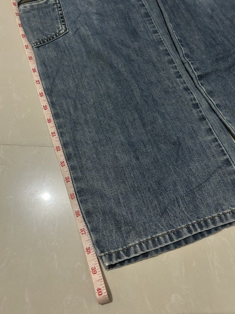 Blue Denim Cargo Pants (Category: Jeans) located in Pasay City. Submitted by haxiea (Listing ID 1460216181, Image 3). Description: - High-waisted blue denim cargo pants .