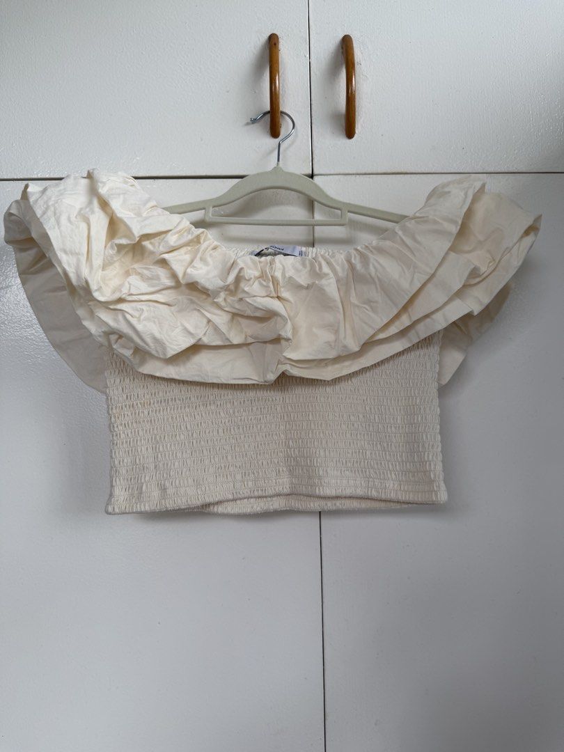 [BNWT] Mango Ruffle Tube Top (Category: Blouses) located in Paranaque City. Submitted by marjdom23__ (Listing ID 1460155936, Image 2). Description: • Never worn, still brand new • Has a washable stain due to storage • RFS: Decluttering .