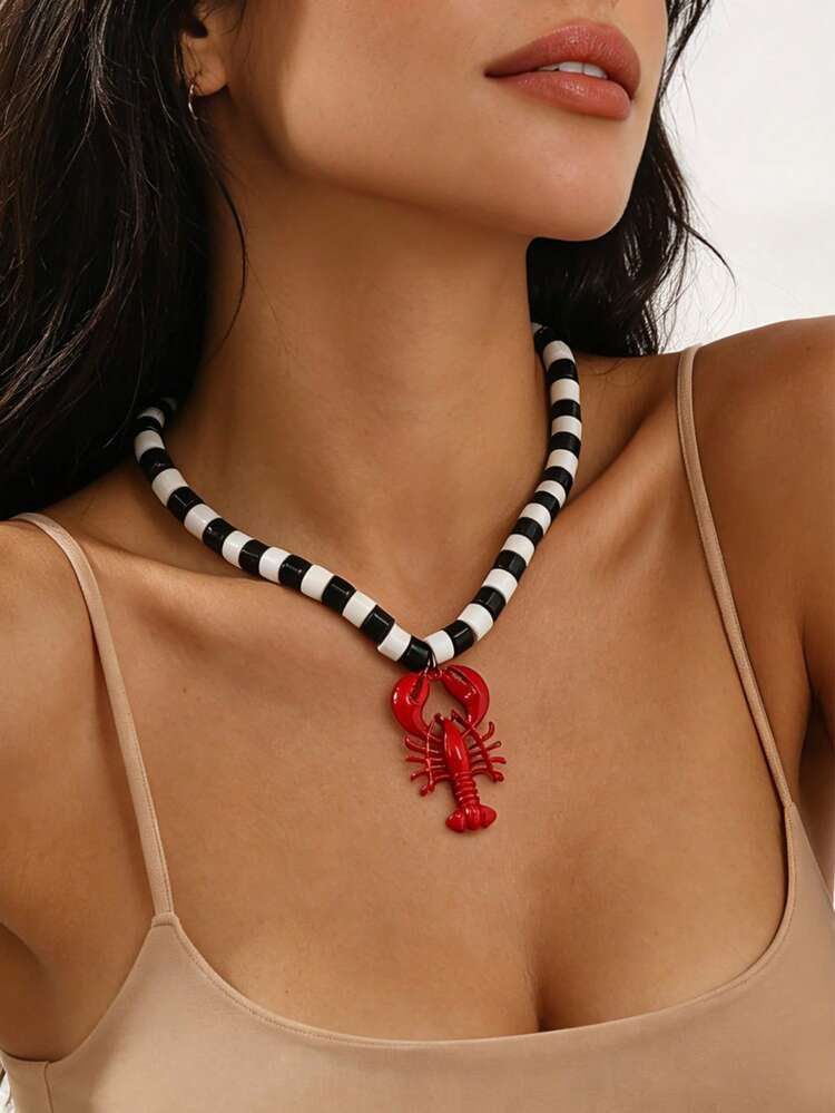 Bohemian summer necklace (Category: Necklaces) located in Ligao. Submitted by veetrinkets (Listing ID 1460260707, Image 1). Description: -enamel metal lobster pendant -18 inches -plastic beads -lobster clasp -no tarnish .