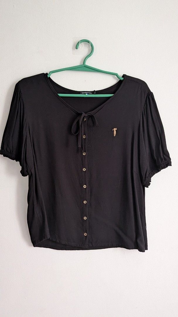 Bossini Black Short Sleeve Top (Category: Blouses) located in Quezon City. Submitted by maff_mallow (Listing ID 1460112944, Image 1). Description: ✅No issue/damages ✅Large size ✅100% Cotton .