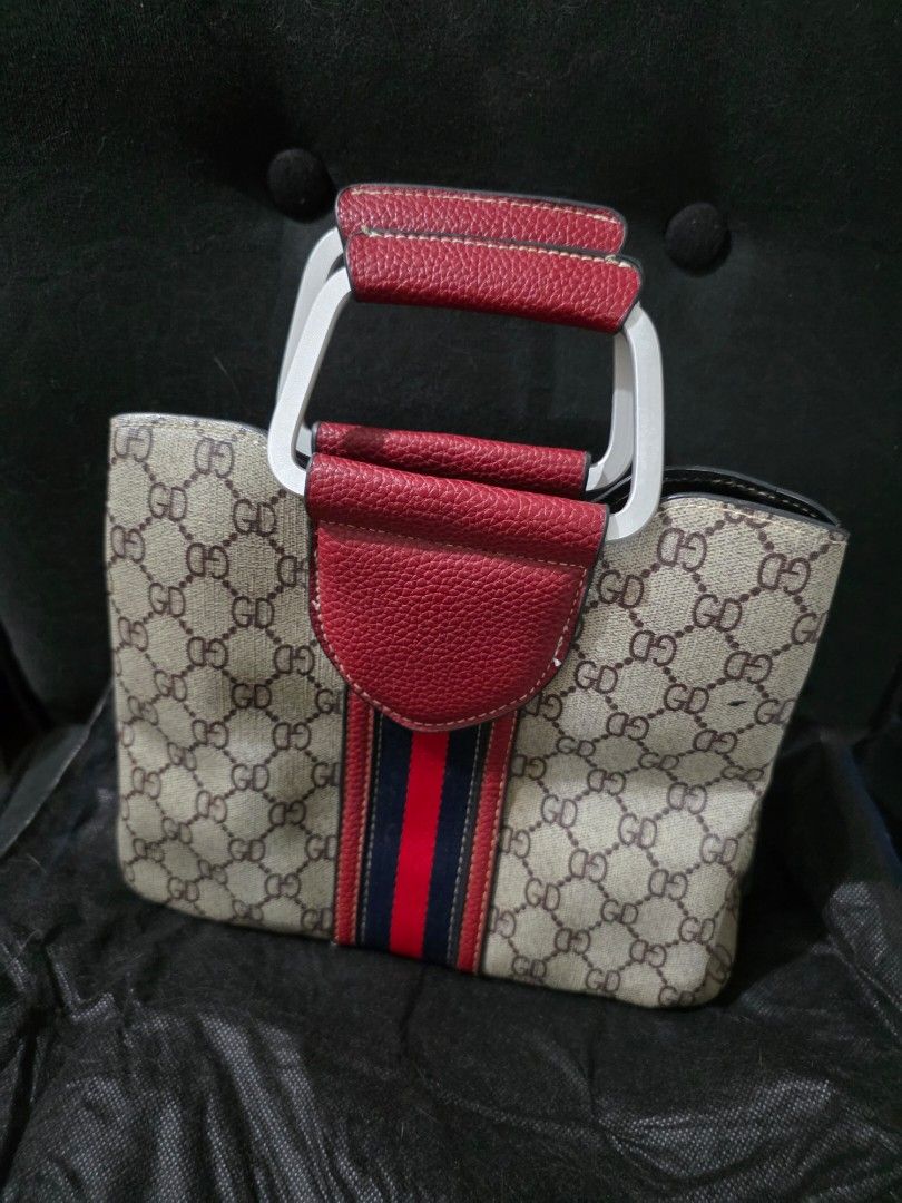 Boxy Hand Bag (Category: Clutches) located in Quezon City. Submitted by cottoncandyqc (Listing ID 1460122046, Image 1). Description: no fades in hardware, working zippers and latches very sturdy fabric and leather panels still pristine can use long straps to attach for shoulder bag wear around 10x10inches.