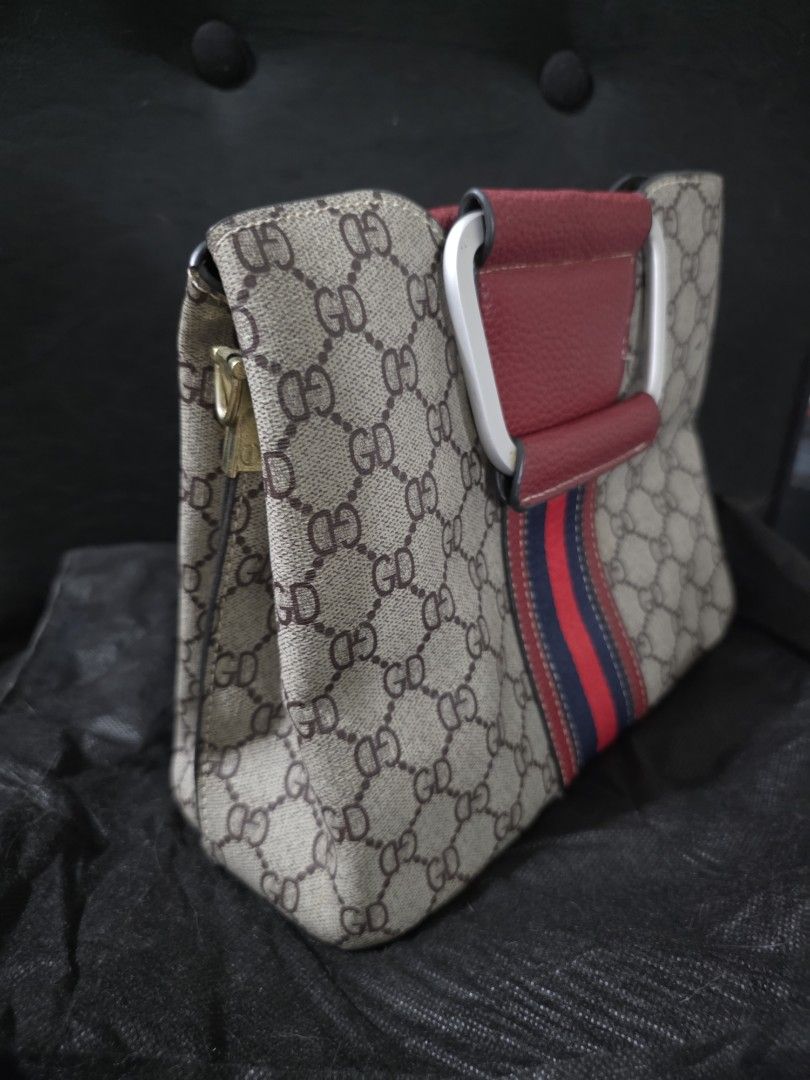 Boxy Hand Bag (Category: Clutches) located in Quezon City. Submitted by cottoncandyqc (Listing ID 1460122046, Image 3). Description: no fades in hardware, working zippers and latches very sturdy fabric and leather panels still pristine can use long straps to attach for shoulder bag wear around 10x10inches.