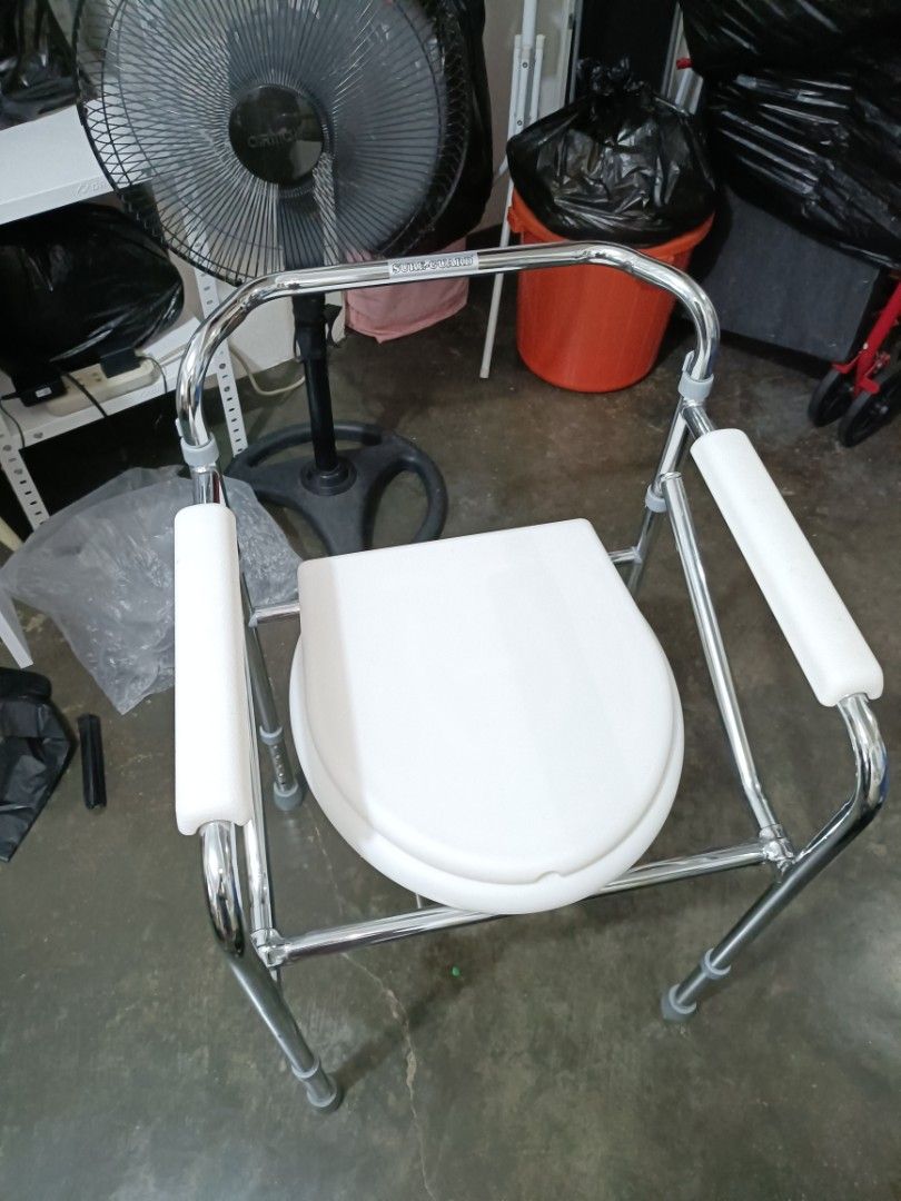 BRAND NEW - Adjustable Commode Chair with Padded Armrests (Category: Medical Supplies & Tools) located in Manila. Submitted by fhayegomez (Listing ID 1460217792, Image 1). Description: - Sturdy chrome frame for durability - Padded armrests for added comfort and support - Removable bucket for easy cleaning and disposal - Adjustable legs to customize height - Ideal for mobility assistance - Easy to maintain and clean.