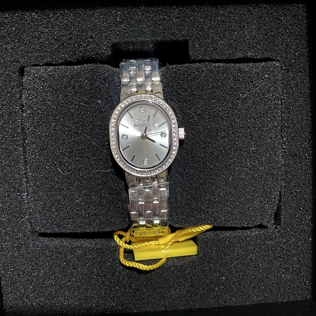 Brand new Invicta Angel Pixie oval watch (Category: Women's Watches) located in Quezon City. Submitted by mselle.usgoodies (Listing ID 1460189719, Image 3). Description: Brand new Invicta Angel Pixie oval watch Dainty watch Brand ne with box Original from USA.