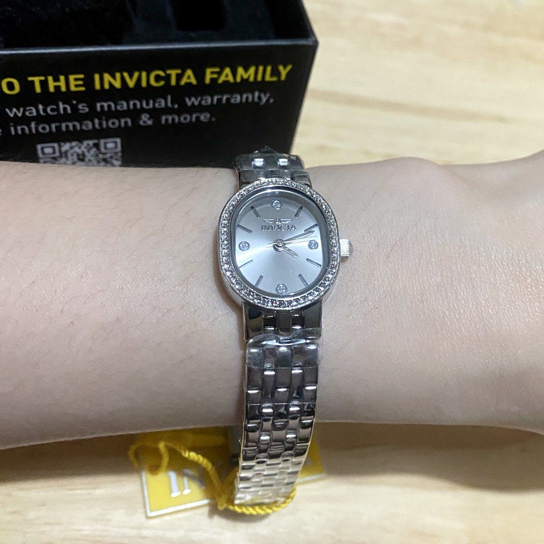 Brand new Invicta Angel Pixie oval watch (Category: Women's Watches) located in Quezon City. Submitted by mselle.usgoodies (Listing ID 1460189719, Image 2). Description: Brand new Invicta Angel Pixie oval watch Dainty watch Brand ne with box Original from USA.