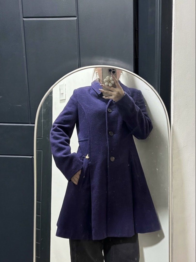 Bread N Butter Purple Button-Down Wool Coat (Category: Coats, Jackets and Outerwear) located in Quezon City. Submitted by itsbiancag (Listing ID 1460299722, Image 2). Description: Brand from France! Brand: Bread n Butter (City Purple line) Size: Size 2 (Fits S–M) Color: Deep Royal Purple / Indigo Features: Single-breasted front buttons, flared A-line silhouette, side welt pockets, small gold/tan embroidered winged pegasus emblem near pocket, full