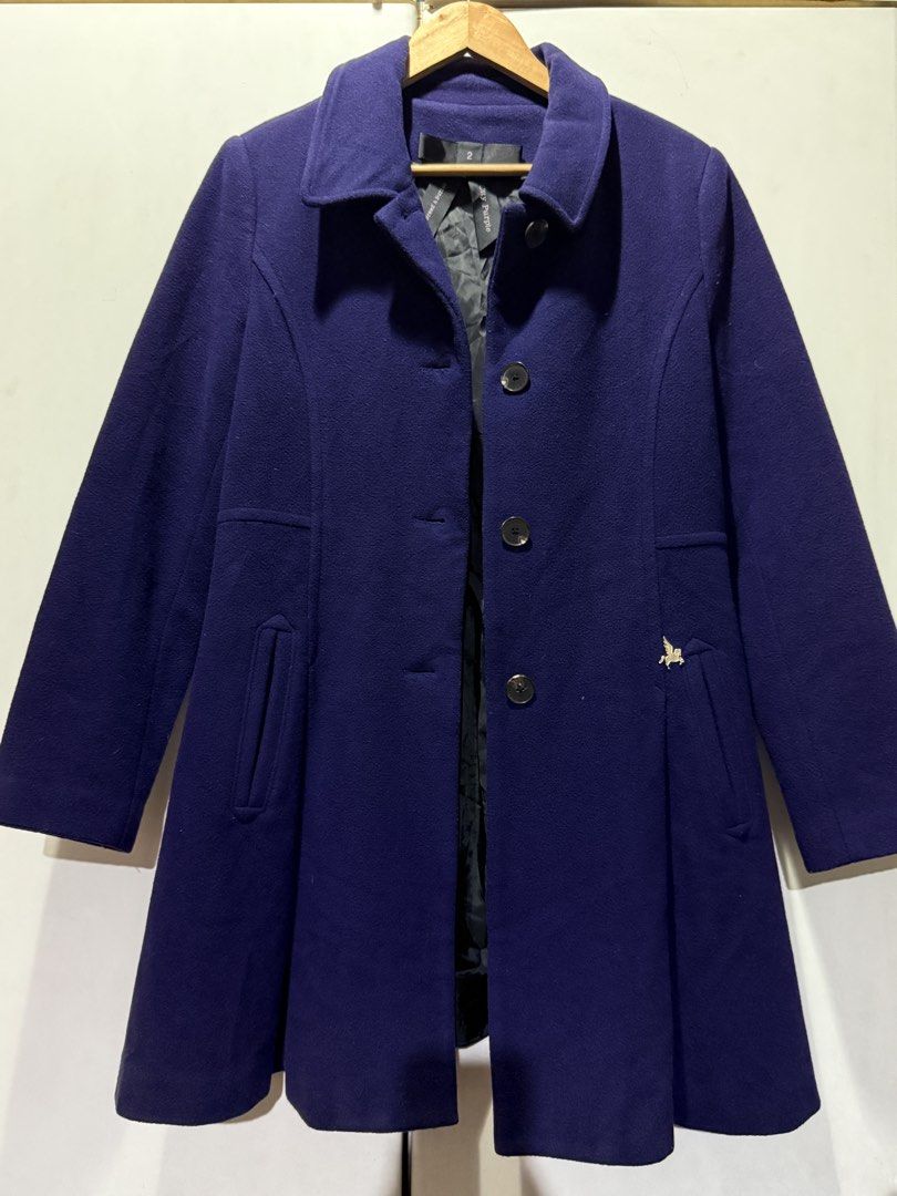 Bread N Butter Purple Button-Down Wool Coat (Category: Coats, Jackets and Outerwear) located in Quezon City. Submitted by itsbiancag (Listing ID 1460299722, Image 3). Description: Brand from France! Brand: Bread n Butter (City Purple line) Size: Size 2 (Fits S–M) Color: Deep Royal Purple / Indigo Features: Single-breasted front buttons, flared A-line silhouette, side welt pockets, small gold/tan embroidered winged pegasus emblem near pocket, full