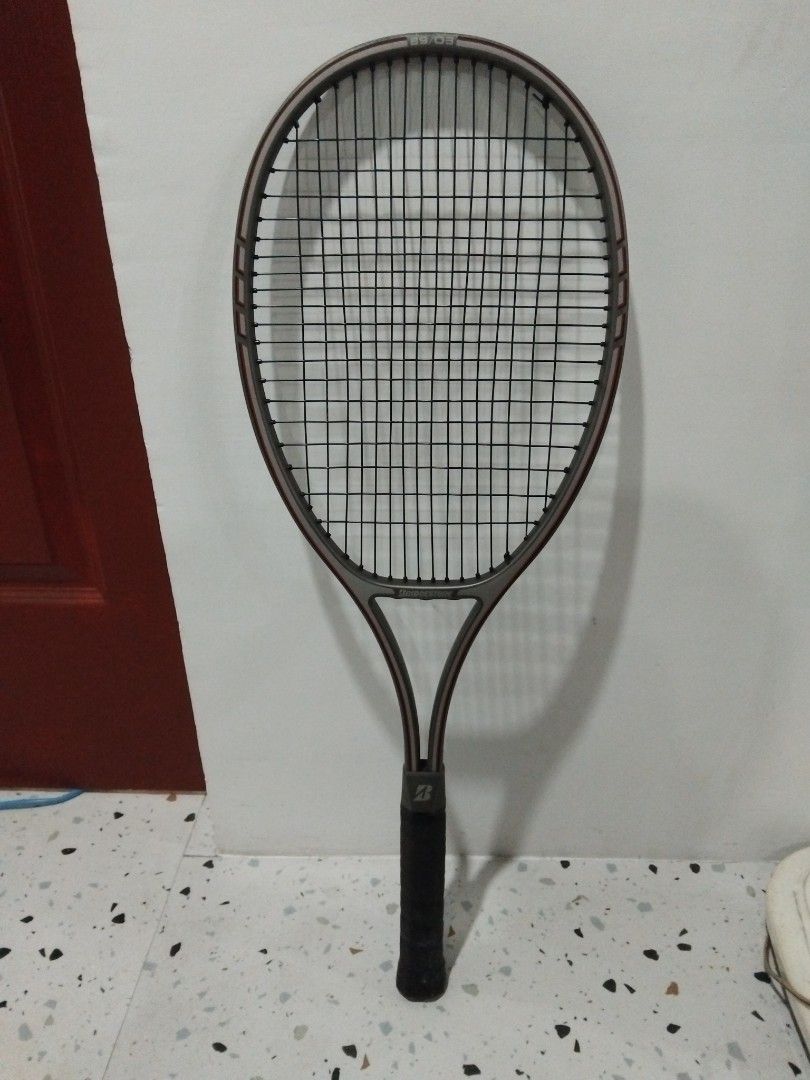 Bridgestone B9/03 Graphite Composite Tennis Racket (Category: Racket and Ball Sports) located in Rizal. Submitted by eazy08 (Listing ID 1460201605, Image 1). Description: Bridgestone B9/03 Tennis Racket. - In Good Condition - Graphite Composite Frame - Made in Taiwan - Grip Size: SL2 (4 1/2) pick-up via lalamove c/o buyer or self pick-up Qc Area .