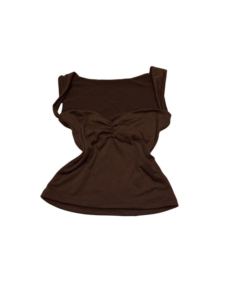 Brown Ruched Bust Tank Top (Category: Sleeveless) located in Manila. Submitted by skylurker.star (Listing ID 1460159678, Image 1). Description: - Cute brown tank top - Features ruched detail at the bust - Sleeveless design - Stretchy material for comfort - Ideal for casual wear or layering - Pairs easily with jeans or skirts.