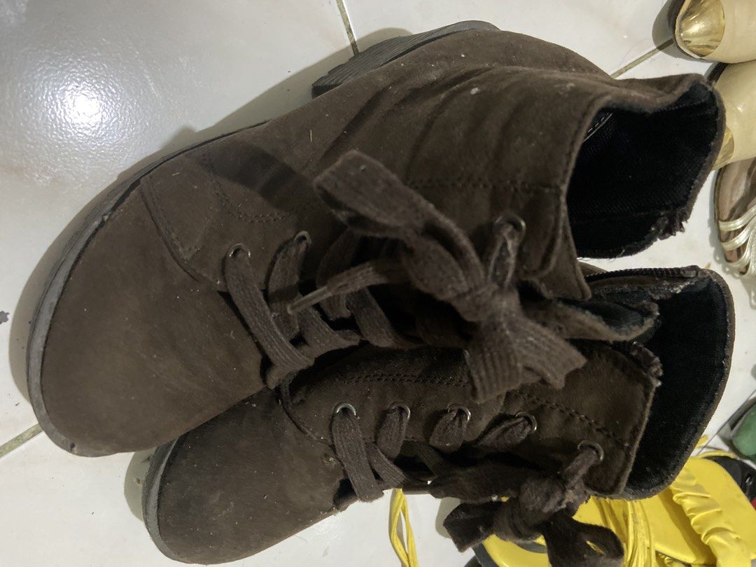 Brown Suede Lace-up Ankle Boots (Category: Boots) located in Quezon City. Submitted by ethereal908 (Listing ID 1460252569, Image 3). Description: - Brown suede ankle boots - Lace-up front with side zipper - Chunky heel for comfort and style - Versatile for casual or dressed-up looks.