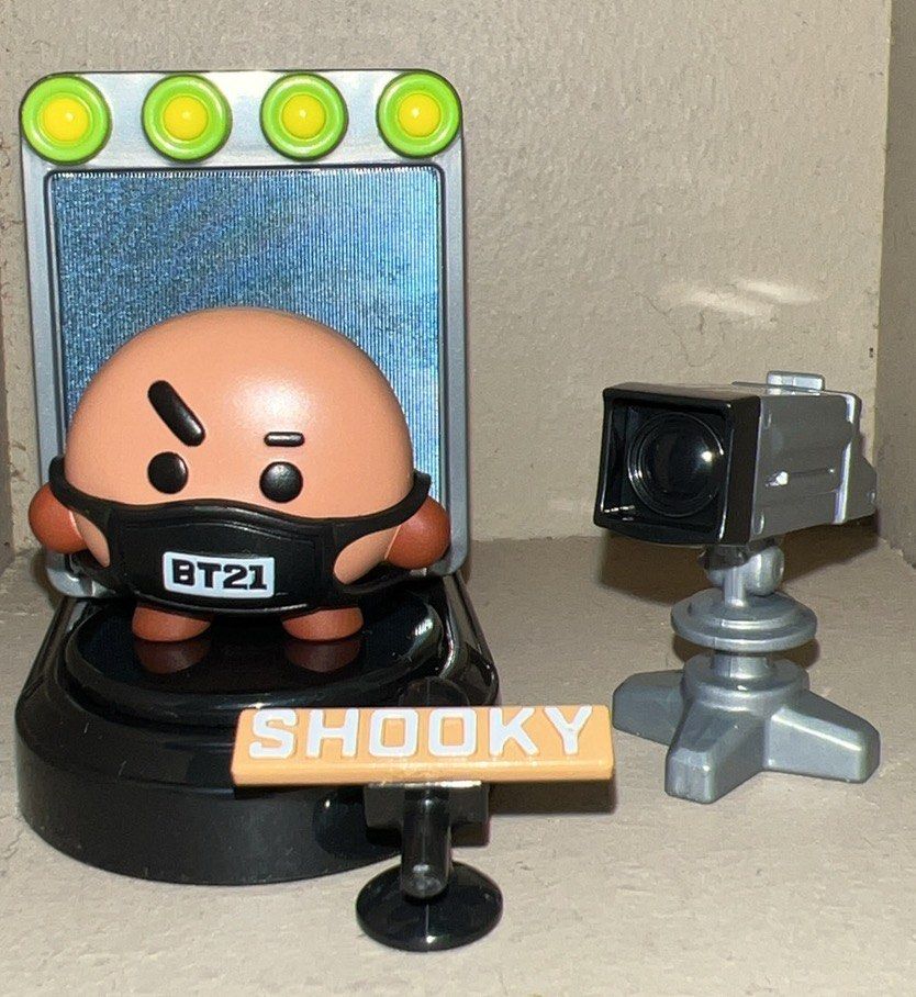 BT21 Shooky Figure with Camera and Stage (Category: Designer & Blind Box Toys) located in Manila. Submitted by bts_planet94 (Listing ID 1460217882, Image 2). Description: - BT21 Shooky figure set - Includes Shooky figure (wearing a mask) - Mini camera accessory - Light-up stage with BT21 logo - Ideal for BT21 collectors and fans - All items shown in photos are included.