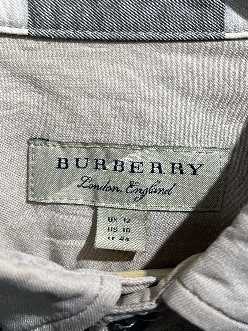 Burberry Check Poplin Long Sleeve Polo (Category: Luxury Apparel) located in Tuguegarao City. Submitted by preowned_curation (Listing ID 1460207165, Image 3). Description: Front Length: 26, Back Length: 28 x 21.5 Fits Large Flaw: Loose stitch side armpit lining Still presentable to wear 800 Free ship!.