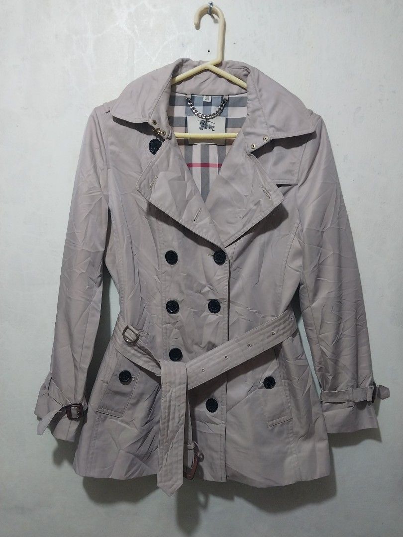 Burberry Double Breasted Trench Coat Beige (Category: Coats, Jackets and Outerwear) located in Manila. Submitted by PrinceDani.Clothing (Listing ID 1460154776, Image 1). Description: Burberry trench coat Medium to large fit 19in width 28in length excellent condition .