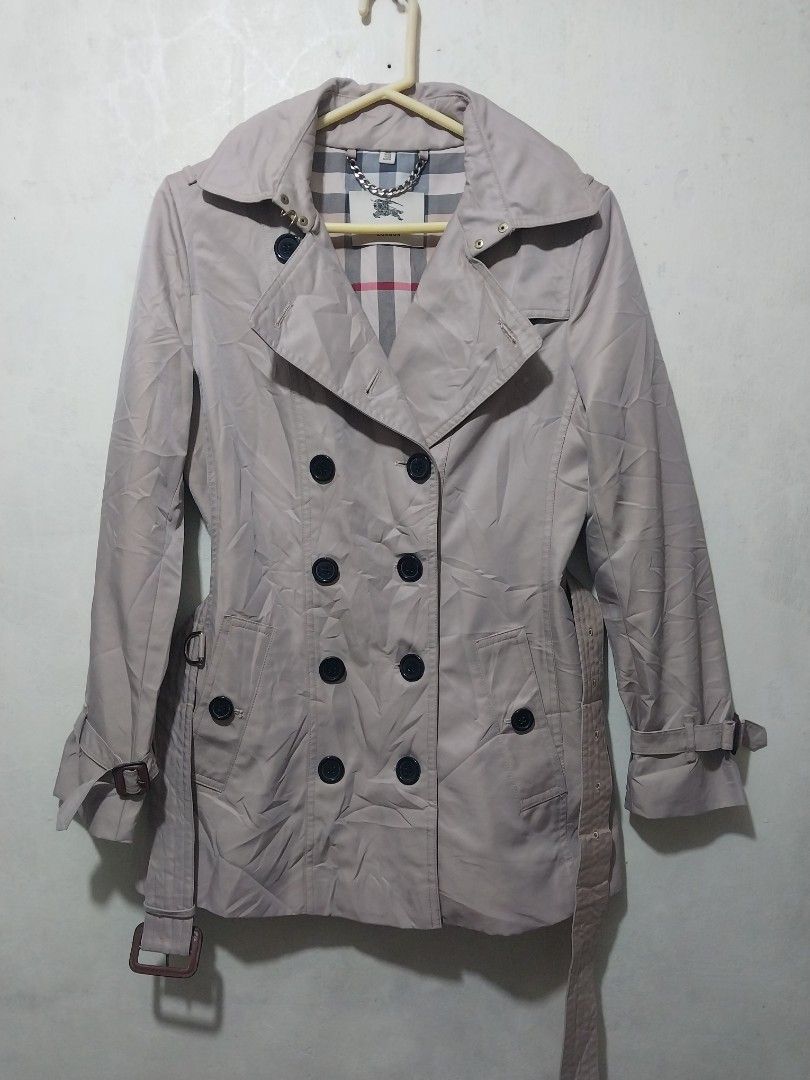 Burberry Double Breasted Trench Coat Beige (Category: Coats, Jackets and Outerwear) located in Manila. Submitted by PrinceDani.Clothing (Listing ID 1460154776, Image 3). Description: Burberry trench coat Medium to large fit 19in width 28in length excellent condition .