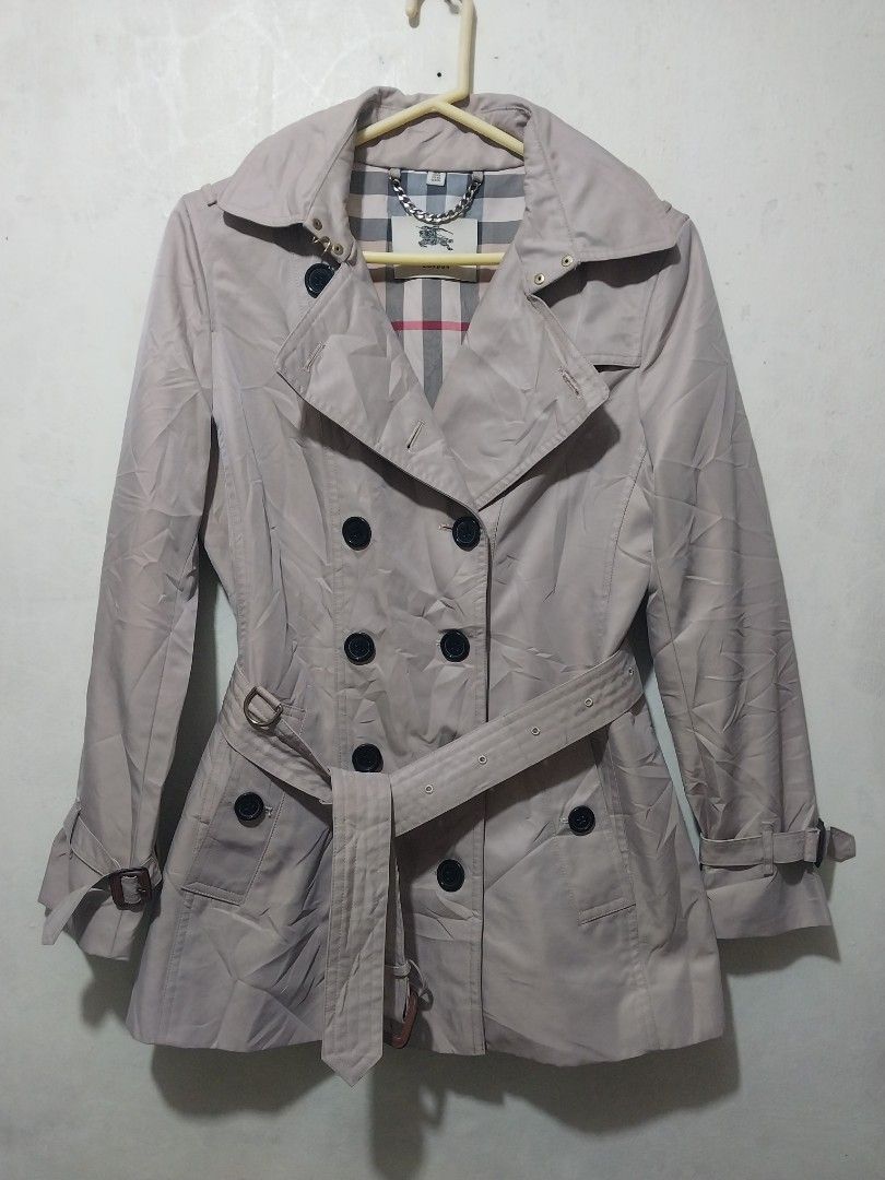 Burberry Double Breasted Trench Coat Beige (Category: Coats, Jackets and Outerwear) located in Manila. Submitted by PrinceDani.Clothing (Listing ID 1460154776, Image 2). Description: Burberry trench coat Medium to large fit 19in width 28in length excellent condition .