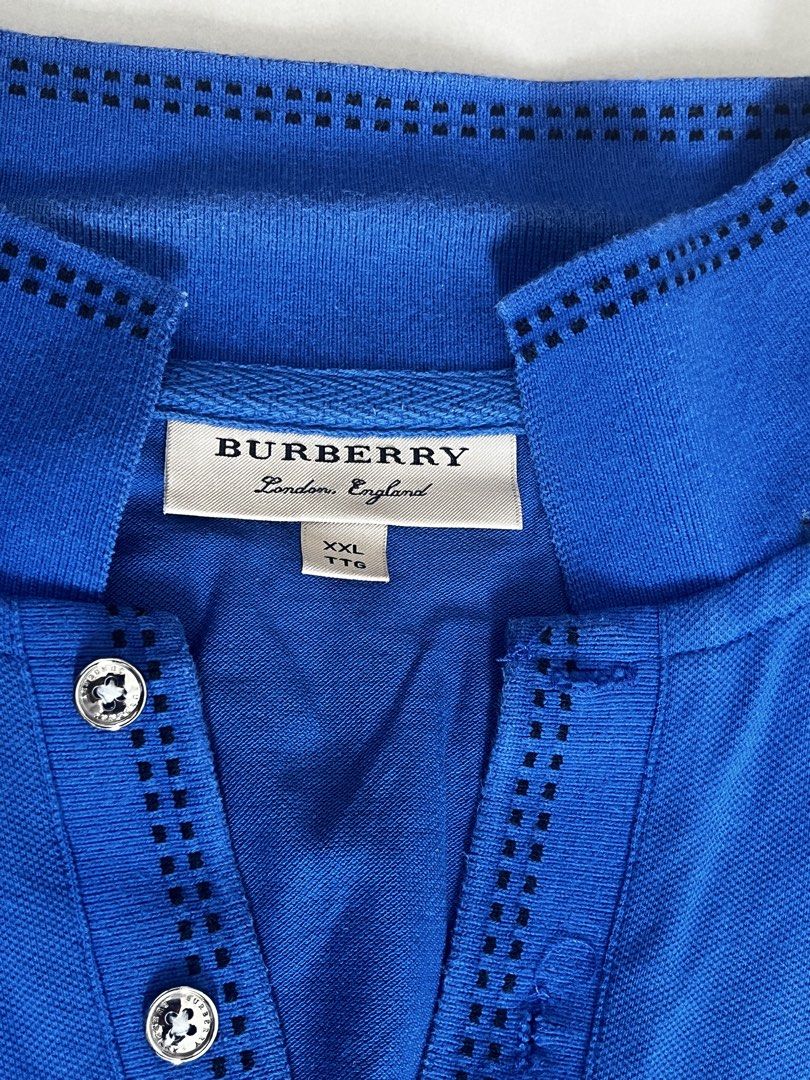 Burberry polo shirt (Category: Luxury Apparel) located in Cuartero. Submitted by johnmichae74239 (Listing ID 1460118838, Image 2). Description: medium to large yung fittings nya even though XXL on tag No issue As new.